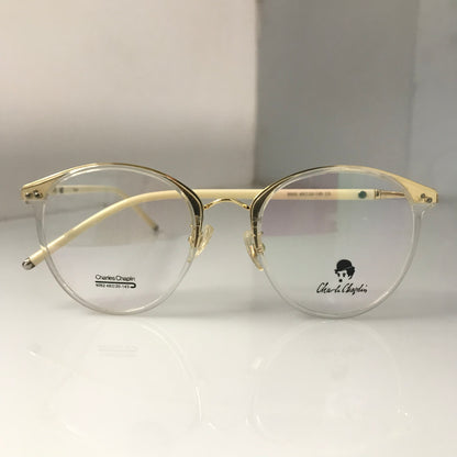 White temples with golden metal frame